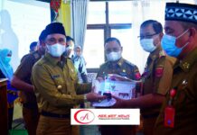 Laksanakan Rapat Koordinasi POP, Bupati Lambar Berikan Penghargaan