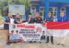 Kaban Kesbangpol Serahkan 200 Bendera Merah Putih Pada PWI Lamtim